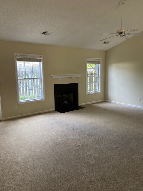 great room with non-working fireplace - 3923 Cloverwood Meadow Ln