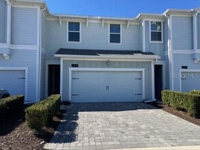 Building Photo - For Rent 3/2.5 townhome 2 Car Garage in Storey Lake,