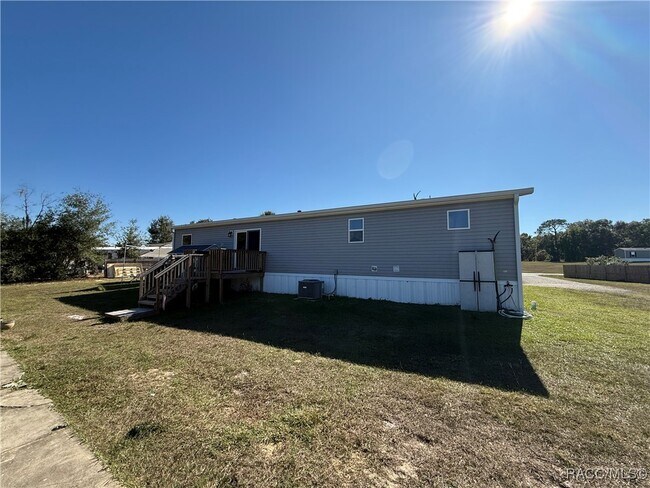 Building Photo - 5469 W Grovepark Rd