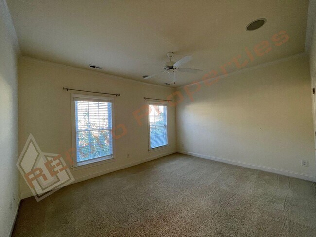 Building Photo - Elegant 3 Story 3 Bedroom Formal Model Tow...