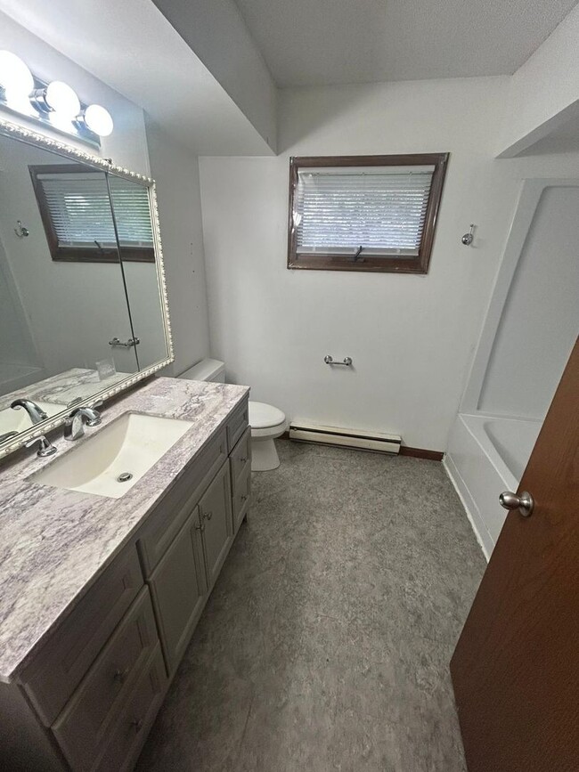 Primary Photo - Updated 2BR, 1BA Brick Unit with Garage in...
