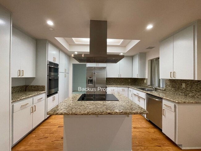 Building Photo - Recently remodeled three bedroom home in T...