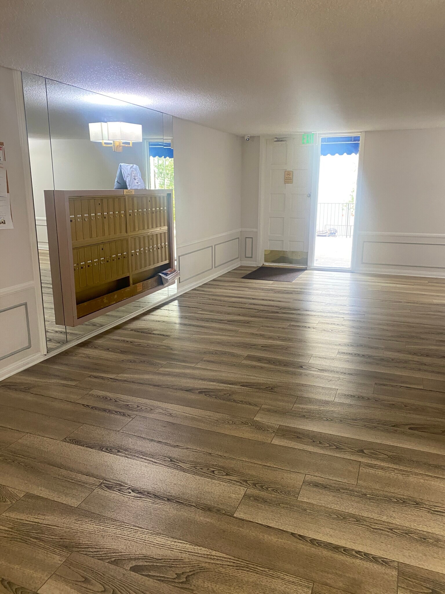 Building lobby and resident mail area - 8305 Summertime Ln