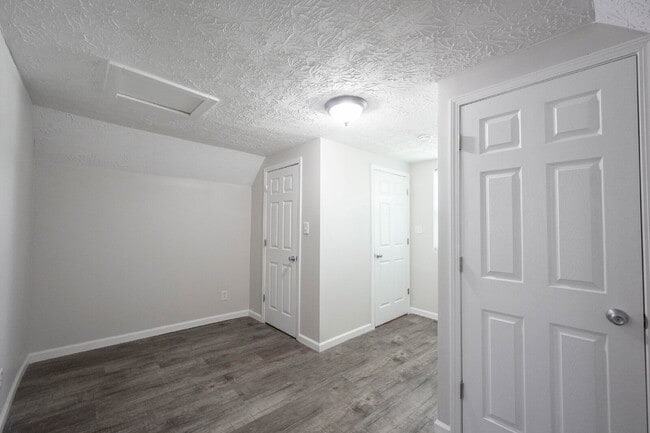 Building Photo - "Spacious 4-Bedroom Gem with 2 Full Baths ...
