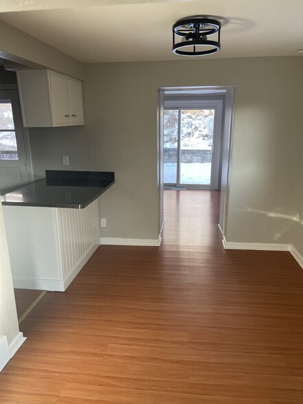 Standing in living room looking through dining room into 3 room - 4614 Mount Troy Road Ext