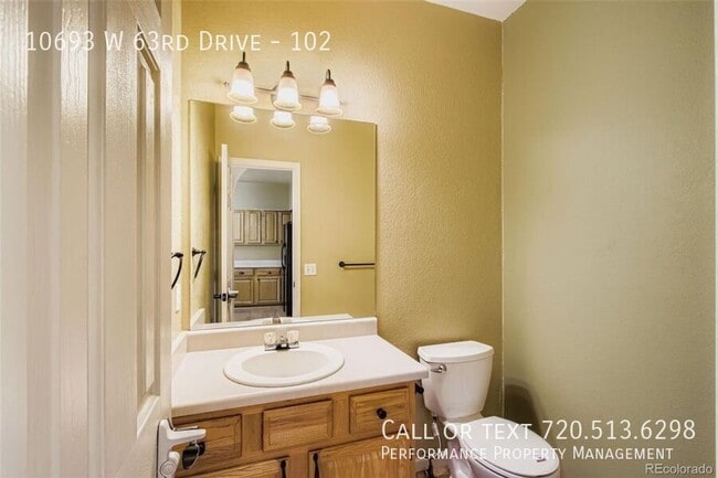 Building Photo - 10693 W 63rd Dr