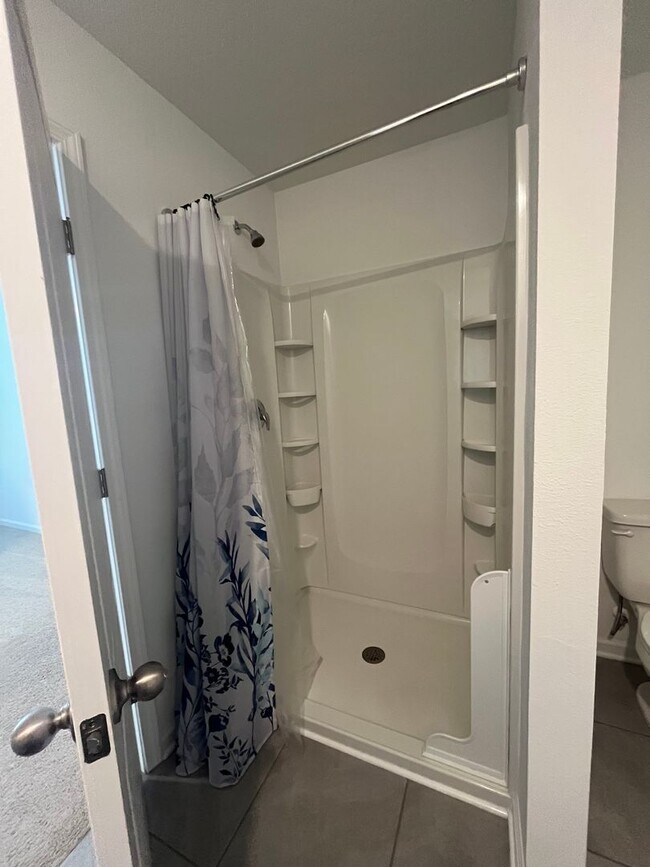 Building Photo - Town Home in The Trails -2 Primary Suites!!