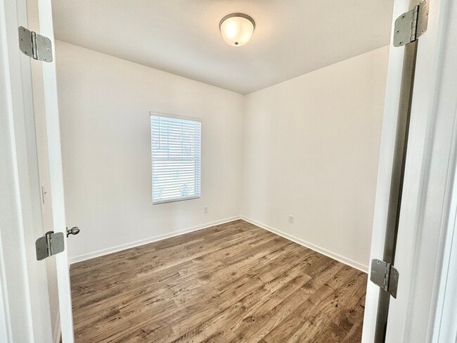 Building Photo - Four bedrooms with 2 1/2 bath with office space and loft