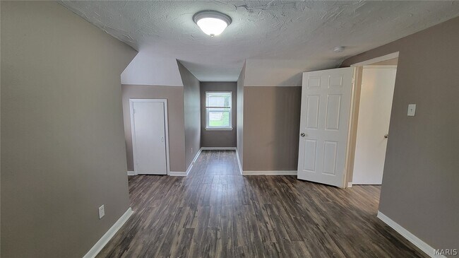 Building Photo - 8720 Marcella Ave