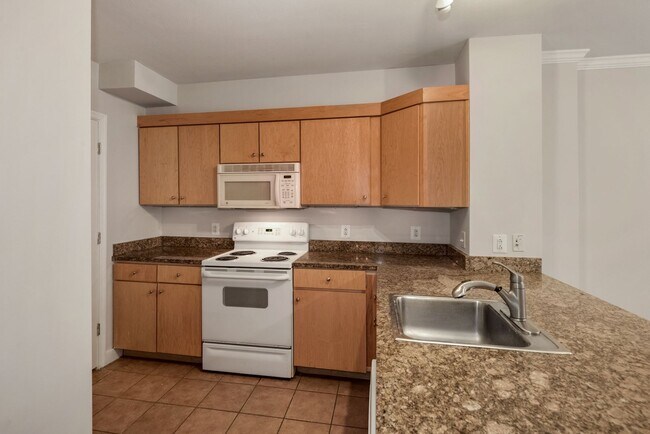 Building Photo - $400 Off! Professionally Managed, Spacious...