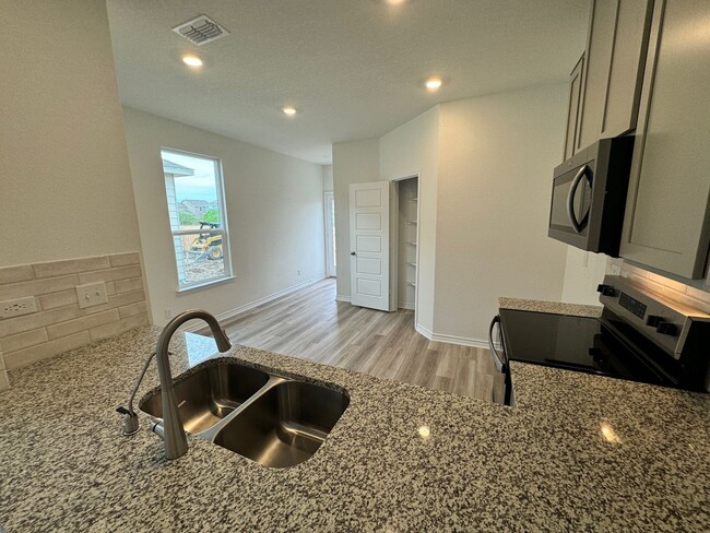 Building Photo - Modern & Brand New 3/2/2 Home in South San...