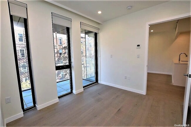 Building Photo - 41-26-41-44 44th St