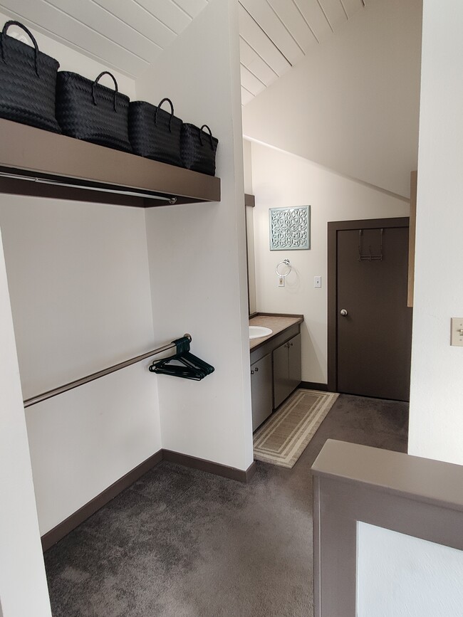 Upstairs closet - 18575 SW Century Dr