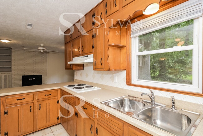 Building Photo - Turn the key. Enter. Smile. Repeat every day!