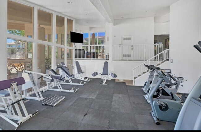 Building Photo - Recently updated condo with gym, pool, and...