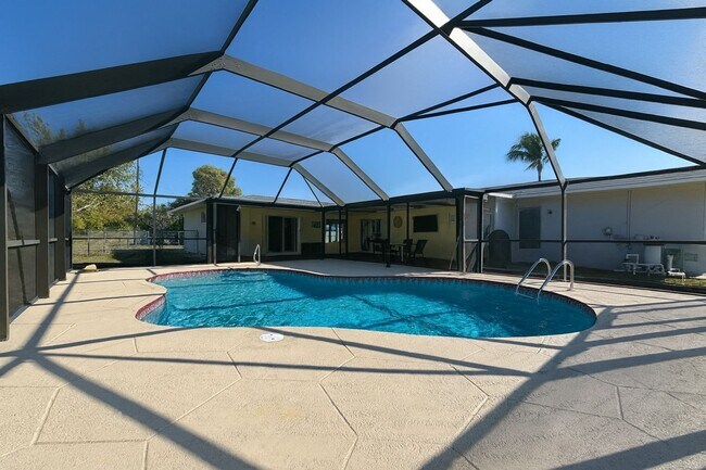 Building Photo - Stunning 3-Bedroom Pool Home in Lehigh – Completely Renovated with Resort-Style Living!