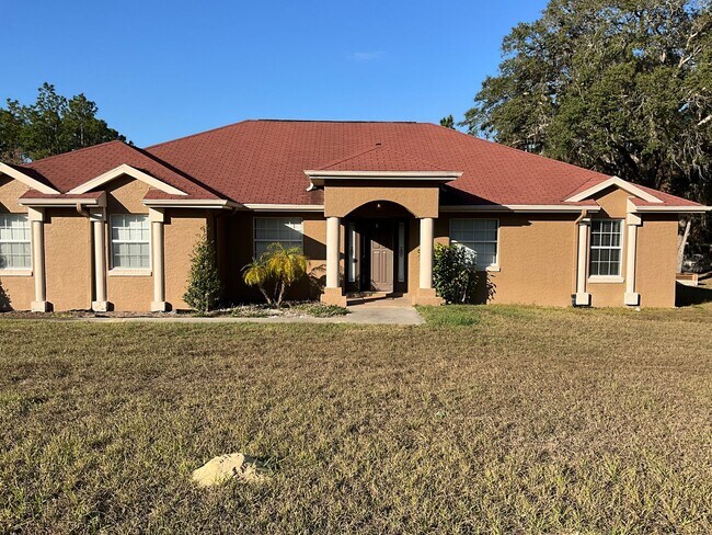 Building Photo - Gorgeous and Beautifully Maintained 3/2 Home on Close to an Acre