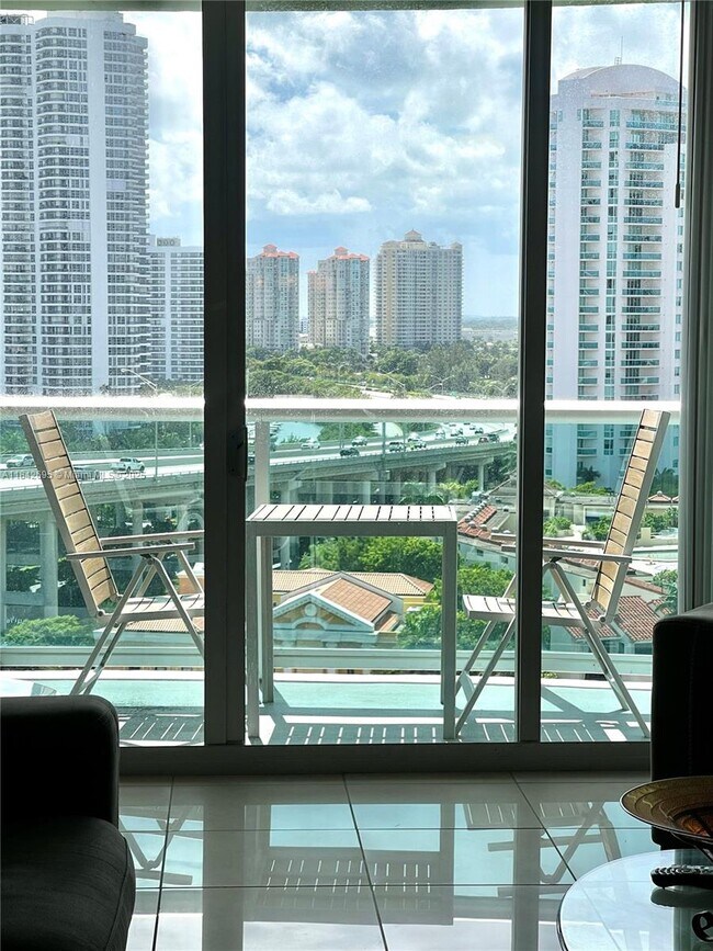 Building Photo - 19390 Collins Ave