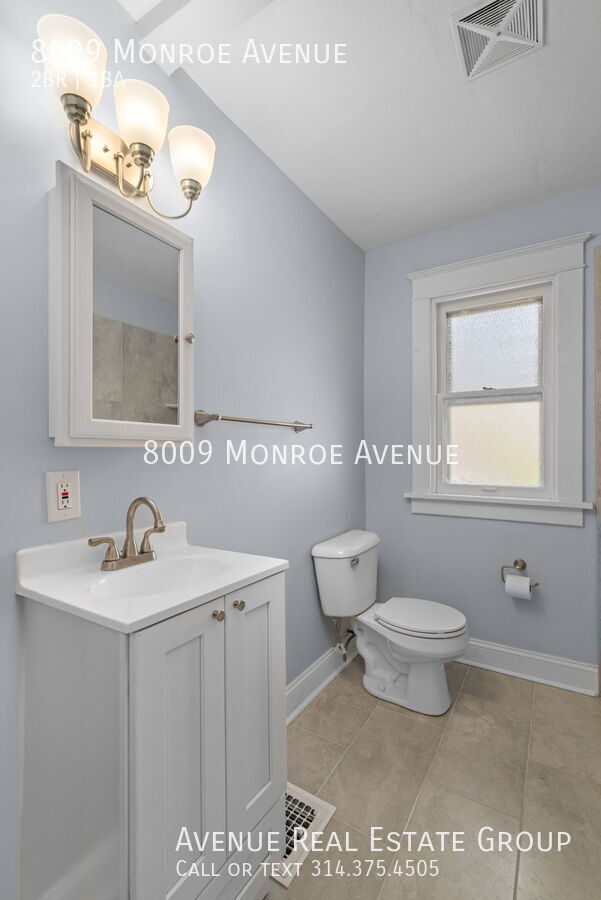 Building Photo - 8009 Monroe Ave