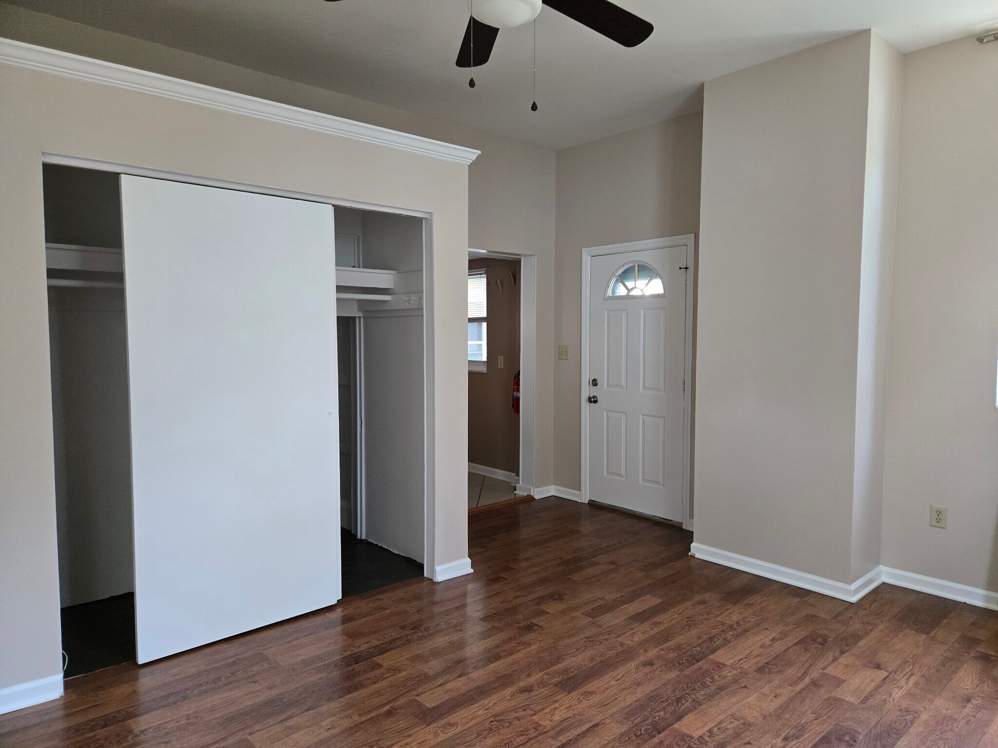 living room to back door and kitchen - 220 Noble Ave