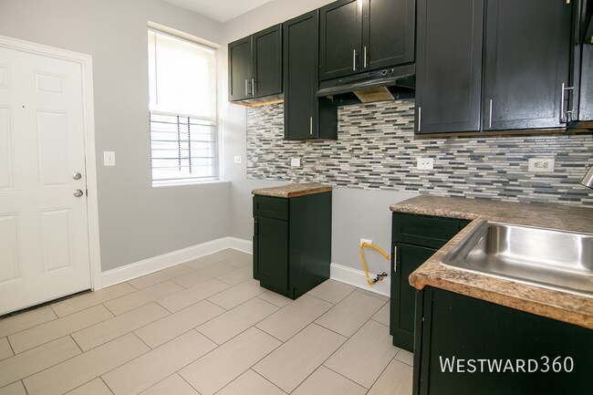 Building Photo - 6424 S Eberhart Ave