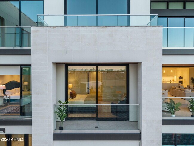 Building Photo - 6587 N Palmeraie Blvd