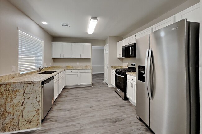 Building Photo - 10011 Storm Meadow Dr