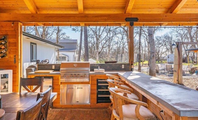 Building Photo - A Private Oasis with Unmatched Amenities 4 Bedroom 3 Bath