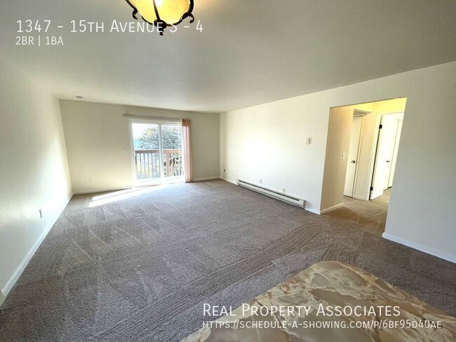 Building Photo - Bright Large Corner Unit Apt - *GARAGE PAR...