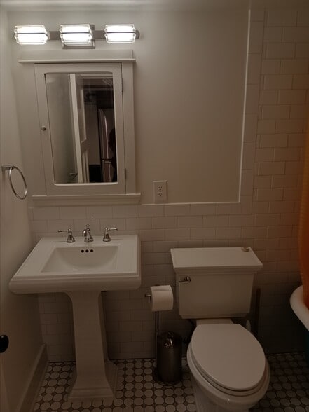 New bath subway tiles - 2329 Clermont St