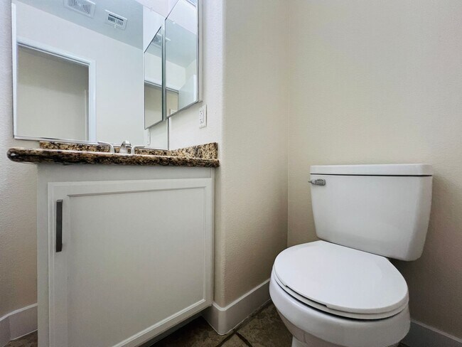 Building Photo - REMODELED, SPACIOUS, 4 BEDROOM HOME WITH VAULTED CEILINGS AND LOFT