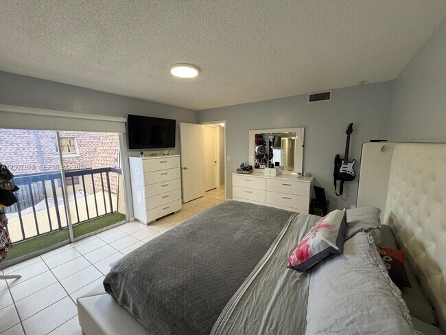 Building Photo - 6580 W 24th Ct