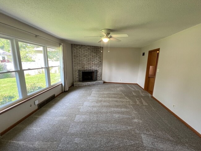 Building Photo - Corner Lot Beauty with Basement & Big Back...