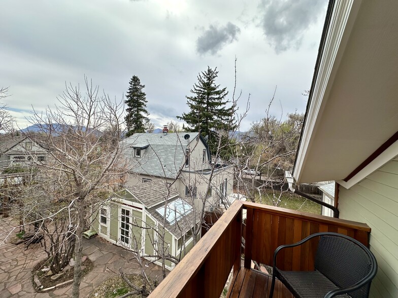 Another view toward the mountains from your private deck. - 812 E Cache La Poudre St