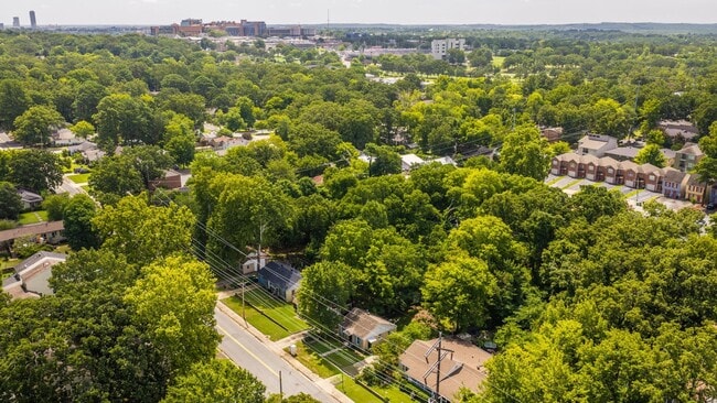 Building Photo - Charming 2BR/1BA Brick Cottage — Hardwoods, Fenced Yard, W/D Included