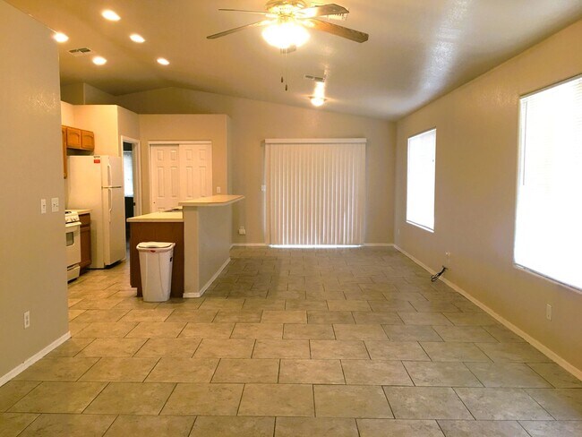 Building Photo - 3-Bedroom Single Family Home with Central Cooling, Attached Garage, and Tile Flooring