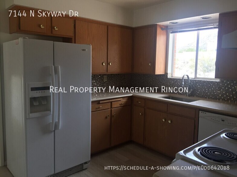 Building Photo - 7144 N Skyway Dr