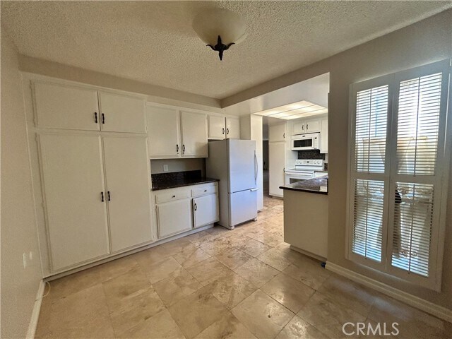 Building Photo - 2404 Via Mariposa W