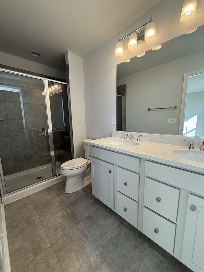 Upstairs, master bath, double vanity - 5977 Cling Ln