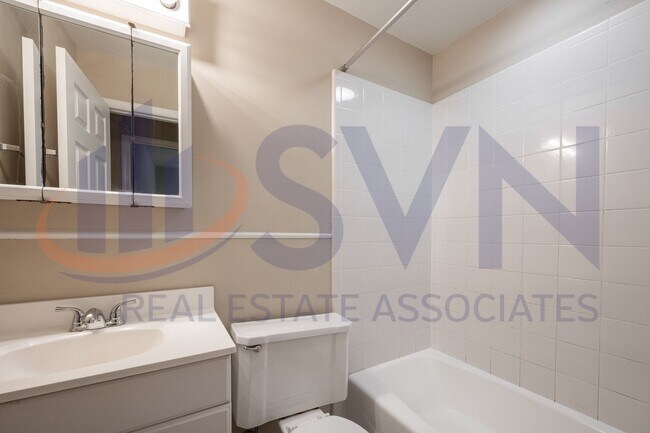 Building Photo - Charming Brick Ranch on a Spacious, Wooded Lot!