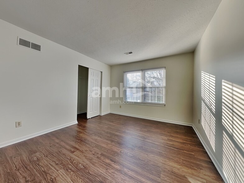 Building Photo - 6312 Satin Wood Dr