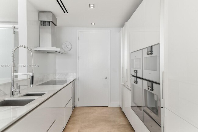 Building Photo - 10203 Collins Ave