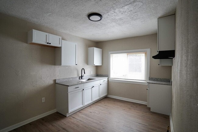 Building Photo - Freshly Renovated 3-Bedroom Home – Quality...