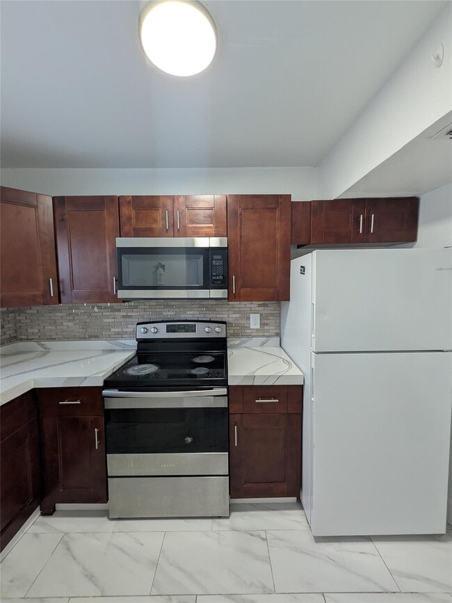 Building Photo - 2456 NW 52nd Ave