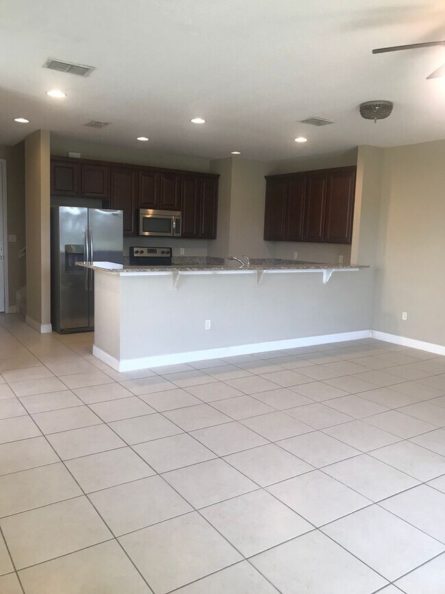 Building Photo - Lake Nona Townhome 3 Bed 2.5 Bath - Move in Special $500 off First Month Rent