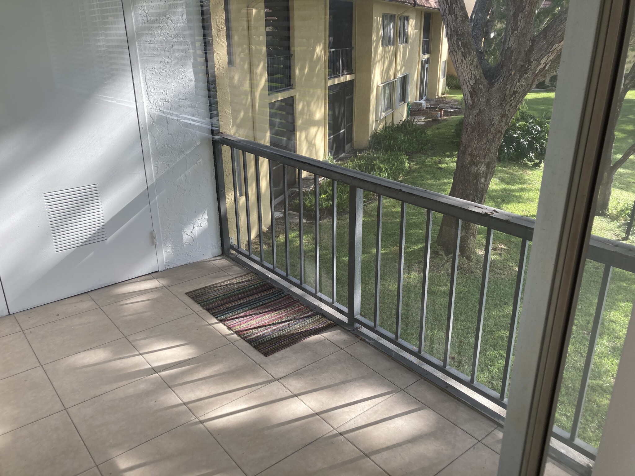 Screened in balcony with lake view - 824 SW 9th Street Cir