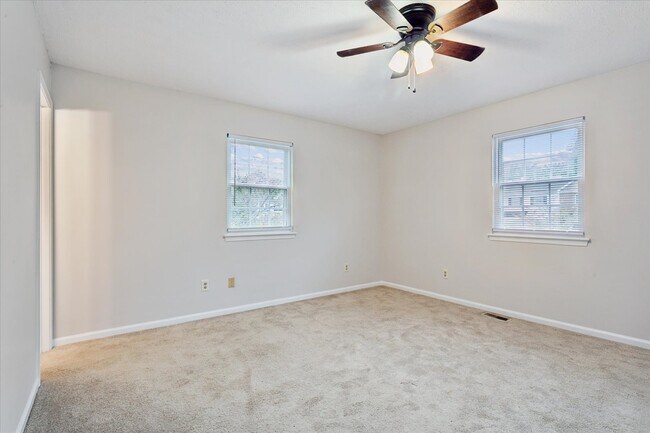 The home offers three spacious bedrooms! - 1644 Skiffes Creek Cir
