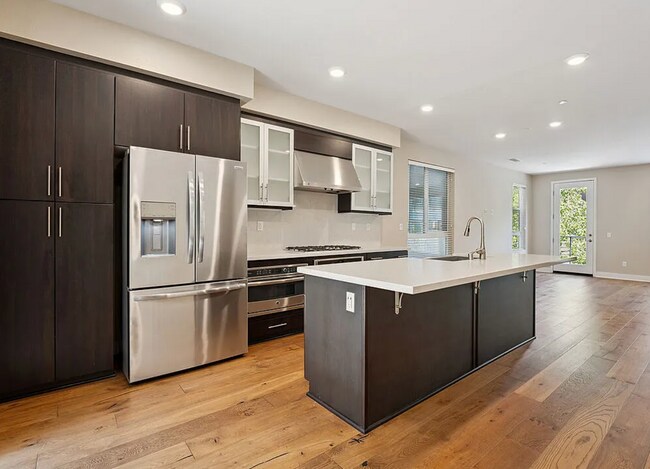 Building Photo - Tucked within the Hollywood Hills in a gated community
