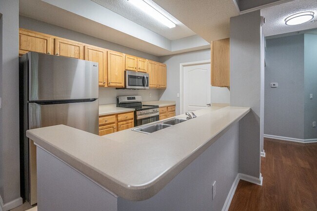 Building Photo - Available for Immediate Move in!  Gorgeous 2 Bedroom Condo with Garage on the 1st Floor!