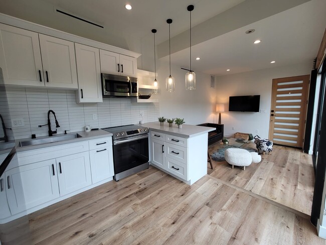 Kitchen and living room - 4100 Sumac Dr